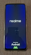 Realme 11 5G za 399 zł. charczy głosnik zewnętrzny