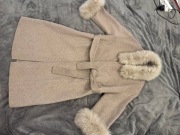 Płaszcz damski wykonany w 100% z wełny merynosów australijskich . Rozmiar S