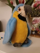 Maskotka Xinle Toys papuga interaktywna niebiesko-żółta