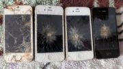 Zestaw 4 szt. Apple iPhone (wygląda na 4/4S) - uszkodzone / na części