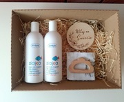 Zestaw prezentowy dla noworodka – Ziaja, pieluszka, gryzak, tabliczka