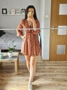 Sukienka króka na długi rekaw z wycięciami wiązana jesień Rita Ora M L