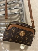 mała bardzo ladna listonoszka na długim pasku