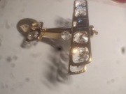 złoty samolocik prezentowy