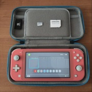 Nintendo Switch Lite + karta pamięci + etui