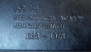 PRL. 150 lat Tarchomińskich Zakładów Farmaceutycznych teczka na dokumenty.