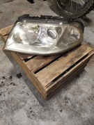 Lewy reflektor volkswagen passat B5 polift