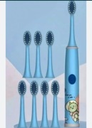 Nowa szczoteczka elektryczna dziecięca Dino kosmos 8 końcówek niebieska 