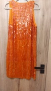 pomarańczowa sukienka mieniąca się  duże cekiny niespotykana