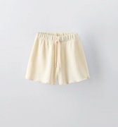 Spodenki Zara 110 Bermudy z dzianiny szydełko szorty kremowe 