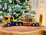 Zdalnie sterowana ciężarówka z przyczepą i pojazdem budowlanym