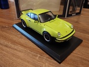 PORSCHE 911 930 3.0L (1976) light green 1:18 Norev 