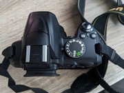 Górny panel z lampą  Nikon d3000