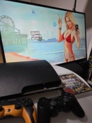 Sony Playstation 3 Slim + 2 pady i gra
