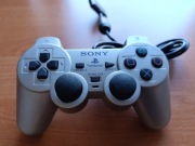 Srebrny kontroler pad PlayStation 2 dual shock uszkodzony 
