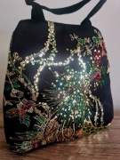 Torebka z haftem pawia