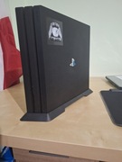 Konsola PS4 Pro + pad + 4 gry