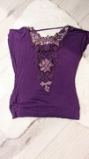 Fioletowa bluzka z ozdobnym dekoltem 38