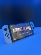 Nintendo Switch OLED + Mario Wonder + pokrowiec + szkła | Stan idealnyy