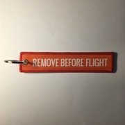 Haft REMOVE BEFORE FLIGHT brelok