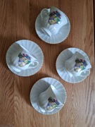 Filiżanki z talerzykami 4 szt. zestaw Jul Fyrklövern motyw świąteczny