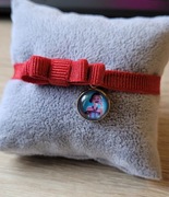 Bransoletka na szczęście kokardka czerwona Huntrix