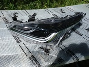 Toyota Corolla E21 sedan Fulled lampa reflektor lewa strona