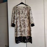 Sukienka uniwersalna M&Co rozmiar 46; tło pistacjowe 