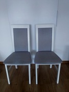 Szare białe krzesła