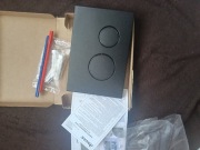 Ravak Przycisk do stelaża Circle WC dwudzielny czarny