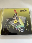 Suede.  Coming up. 