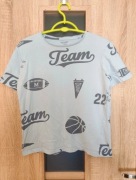 371. Jasno niebieska koszulka t-shirt rozmiar 158