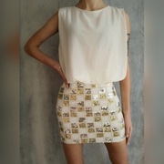 Sukienka cekinowa kremowa mini Club L. Rozmiar XS 