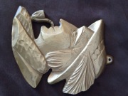 Płaskorzeźba metalowa z wizerunkiem górala z fajką