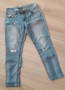Spodnie jeansy z dziurami r.38