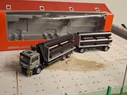 Herpa MAN TGS z HDS i ładunkiem rur