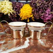 Dwie kremowe filiżanki z koszyczkiem - August Frank - Kahla