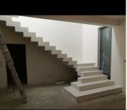 Schody dywanowe#wachlarzowe#z podestem#betonowe