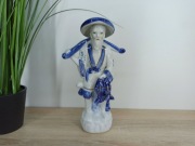 Figurka dekoracyjna – postać rybaka (ceramika)