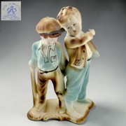 Chłopcy urwisy Arpo Rumunia biskwit lata 60/70te wys.23cm Wyprzedaż