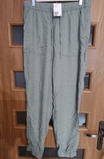 Spodnie damskie z wiskozy przewiewne kolor zielony firma H&M rozmiar 42