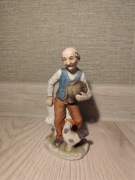 Porcelanowa Figurka Mężczyzna z Kogutem