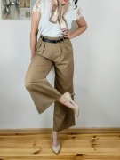 Eleganckie spodnie szerokimi nogawkami ciemnobeżowe z marszczeniem w talii