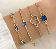 Piękny zestaw 4 bransoletek w kolorze złota z błękitnymi akcentami