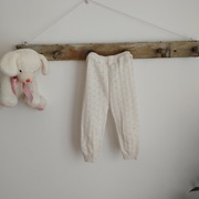 Kremowe legginsy dziewczęce Lupilu 74/80 – 100% bawełna, ażurowe