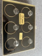 Pozłacane pierścienie na serwetki z kryształami Swarovski  