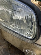Reflektor lampa Opel Omega B prawa 90487568