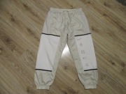 NIKE damskie spodnie sportowe fitness biegi beżowo-białe szybkoschnące_ M