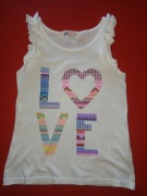 Bluzeczka dziewczęca H&M rozm.110/116