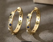 Minimalistyczne kolczyki koła z wstawianymi gwiazdkami w stylu vintage